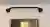 A black pull-up bar mounted across the top of a doorway frame